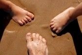 three-barefoot-on-the-sand